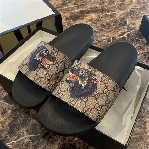 Buy Gucci GG Supreme Slide 'Wolf' .